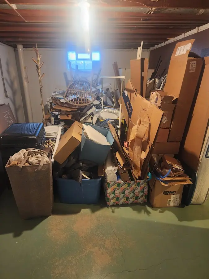 Roll-off dumpster container at job site for Cleanout Dumpster Rental in Boxford